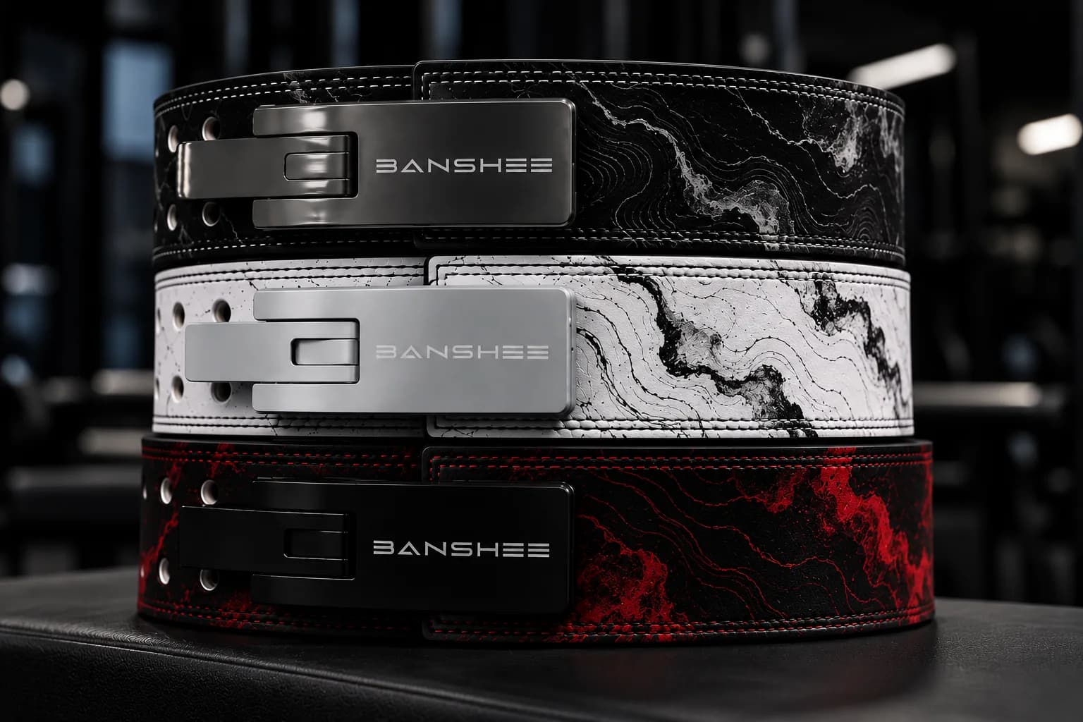 BANSHEE concept powerlifting belts in a dark training environment